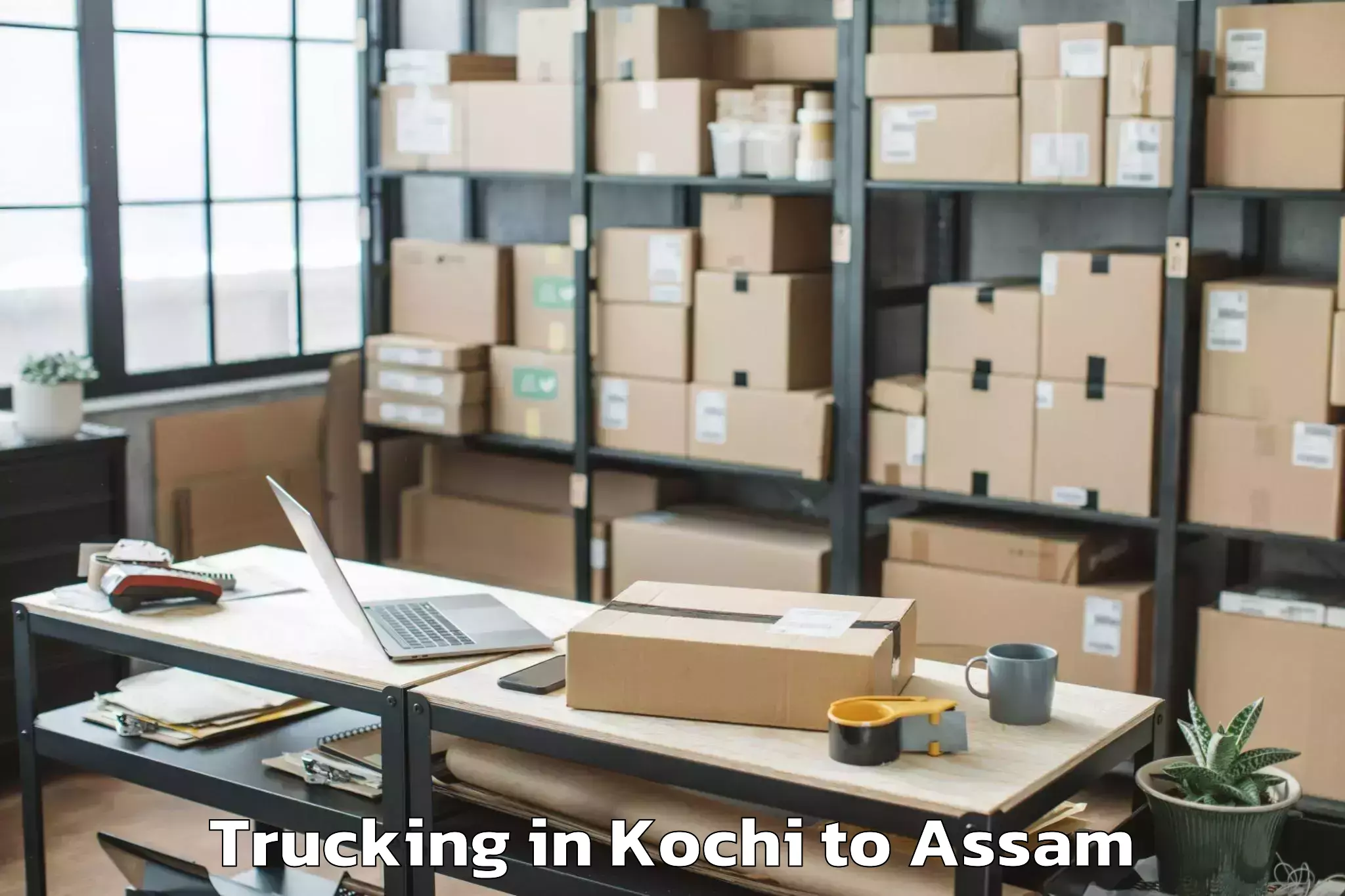 Leading Kochi to Kalgachia Trucking Provider